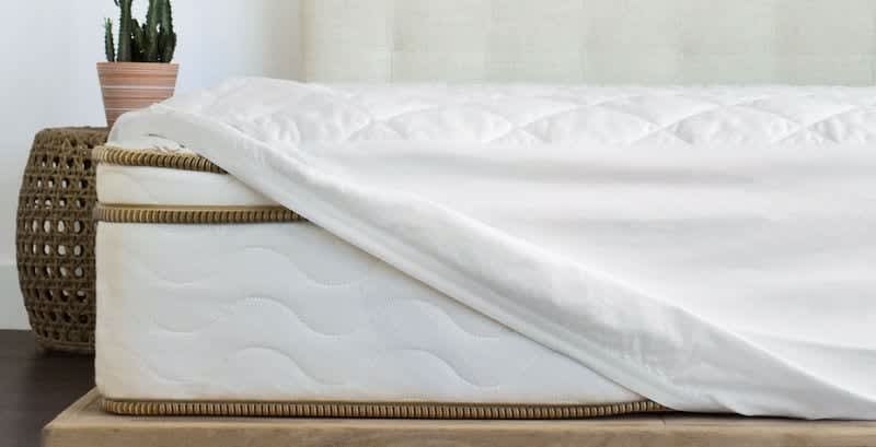 The Best Mattress Pads of 2026 - Saatva Organic Mattress Pad image 1