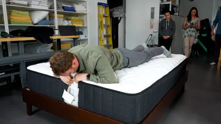 Sleep Foundation tester evaluating the edge support of the Brooklyn Bedding Titan Plus mattress
