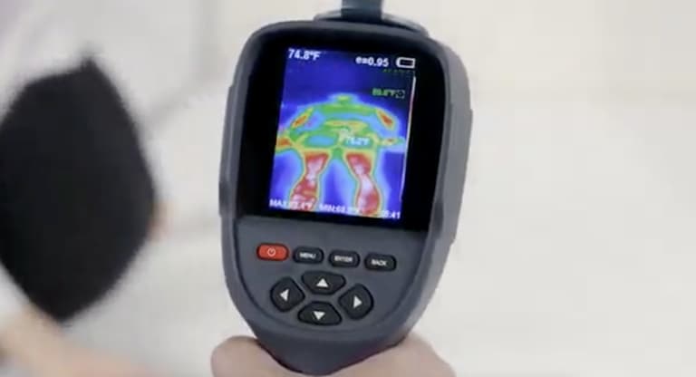 Thermal camera displaying heat retention on a mattress during Sleep Foundation testing