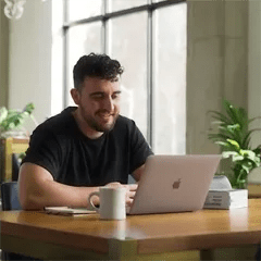 A photo of a man on a video chat appointment with a doctor