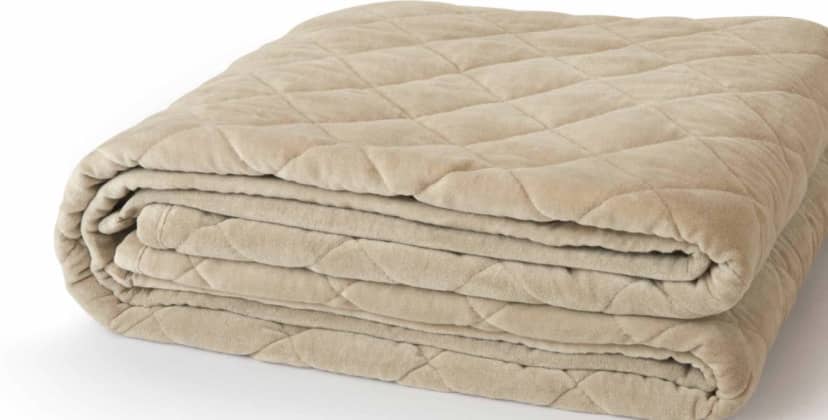 Product page photo of the Saatva Organic Weighted Blanket