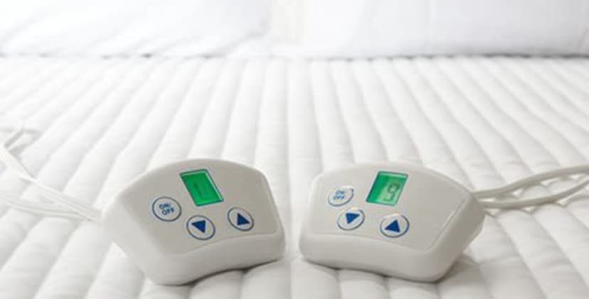 Product page image of the Sharper Image Dual Heated Mattress Pad
