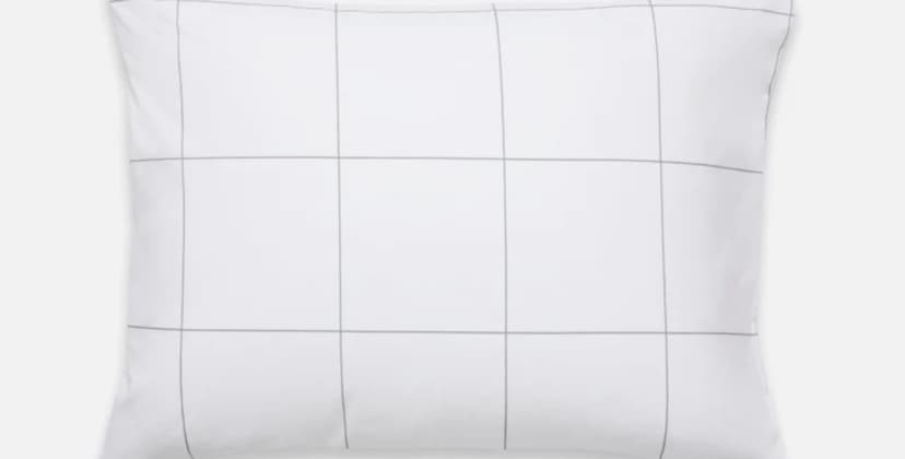Product page photo of the Brooklinen Luxe Sateen Pillowcase