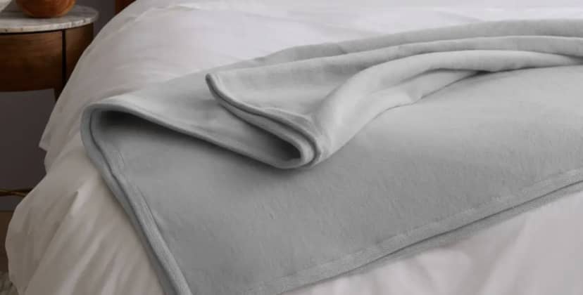 Product page photo of the Quince Organic Cotton Fleece Blanket