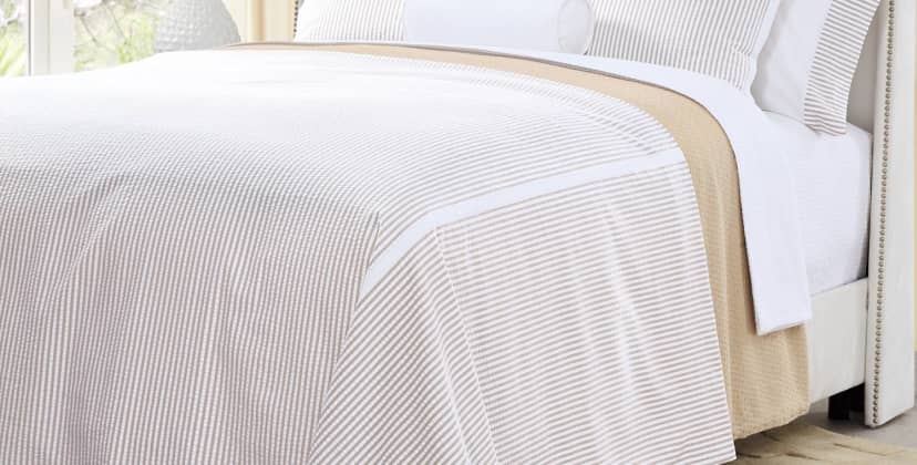 Product image of the CuddleDown Seersucker Striped Percale Tailored Bedspread